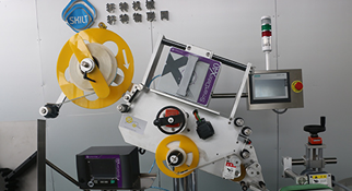 貼標機廠家生產的圓瓶貼標機為什么在市場上受到歡迎？